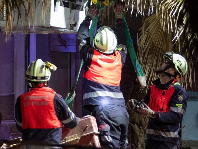 Emergency staff's members work after a two-storey restaurant collapsed, killing four and injuring 17 people on Playa de Palma, south of the Spanish Mediterranean island's capital Palma de Mallorca, on May 23, 2024. Four people died and 17 were injured after the roof of a two-storey restaurant collapsed on Spain's Mediterranean island of Mallorca on May 23, 2024, AFP reported. (Photo by Jaime REINA / AFP)