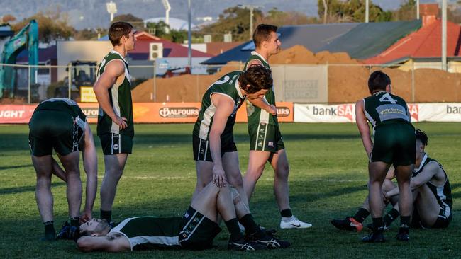 Dejected Seaton Ramblers following the club’s grand final defeat to Scotch Old Collegians in 2018. Picture: AAP/Morgan Sette