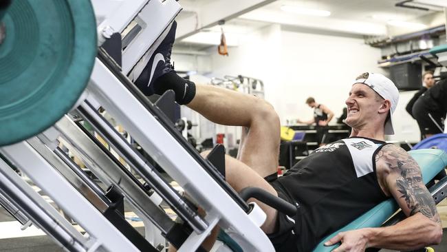 Hartlett working out in the gym as he recovers from an ACL injury. Picture SARAH REED