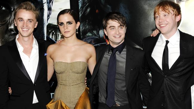 Felton with his Harry Potter co-stars Emma Watson, Daniel Radcliffe and Rupert Grint in 2011. Picture: AP Photo/Evan Agostini