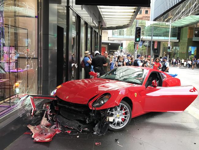 The Ferrari 599 crashed into the front window of Ole Lynggard Copenhagen jewellery story on Market St. Picture: Bob Barker