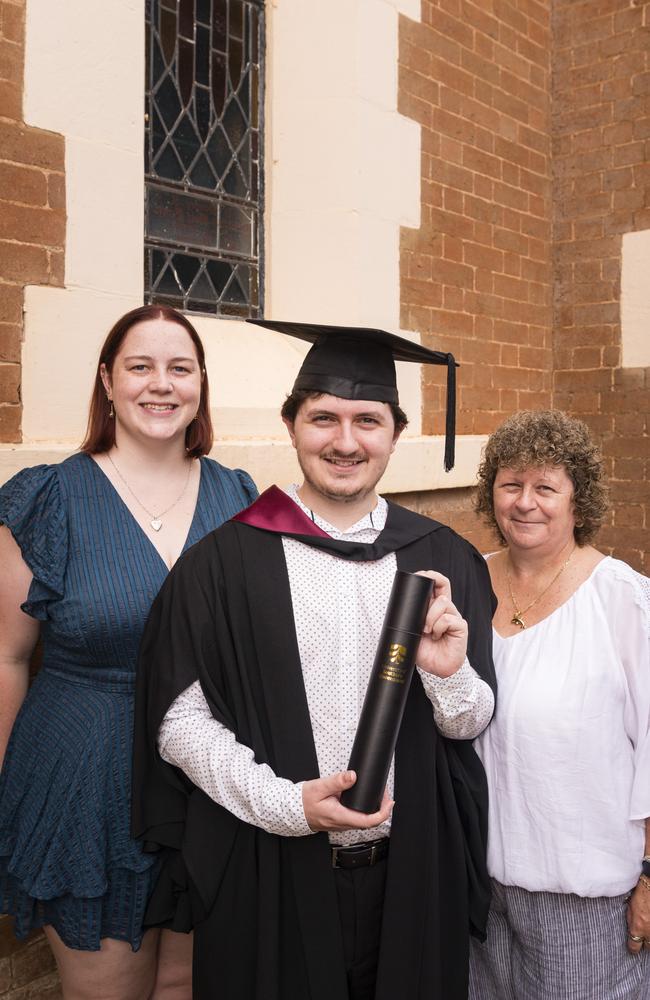 Bachelor of Engineering (Honours) graduate Joshua Carter with Taylor Hughes (left) and Michelle Carter at a UniSQ graduation ceremony at Empire Theatres, Wednesday, February 14, 2024. Picture: Kevin Farmer