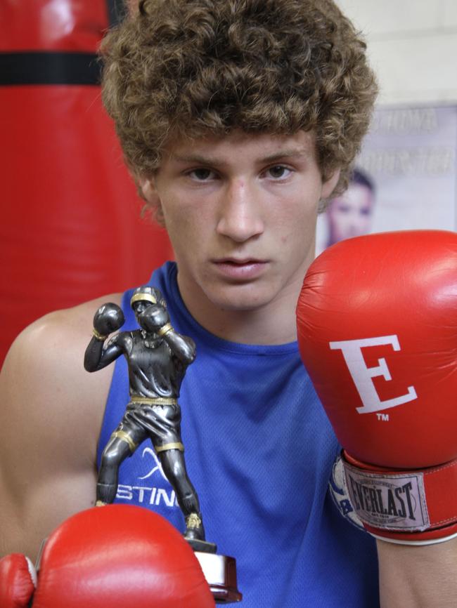 A 15-year-old Mitch Hallahan won a Victorian boxing title.