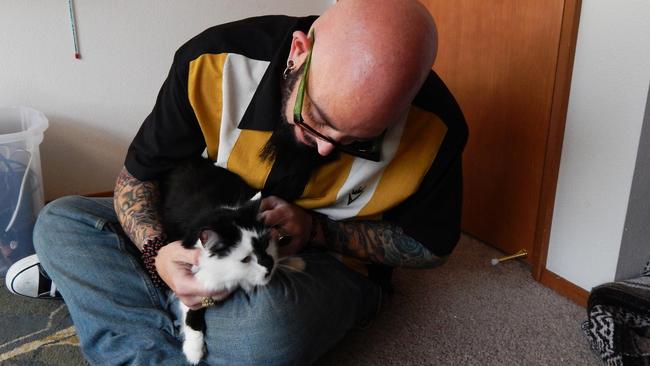 Cat capers ... the brilliantly named Jackson Galaxy gets to grips with twitchy kitty Lux in My Cat From Hell.