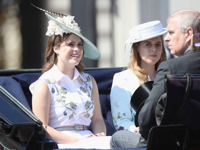 Princess Beatrice with sister Princess Eugenie and father Prince Andrew. Picture: Getty Images