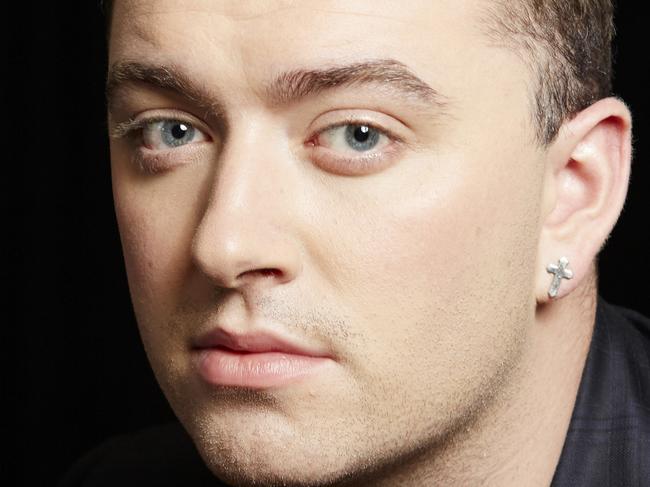 FILE - In this Wed., Sept. 17, 2014 file photo, British soul singer Sam Smith poses for a portrait, in New York. Smith is competing against Beck, Beyonce, Ed Sheeran and Pharrell for album of the year at this year's Grammy Awards on Sunday, Feb. 8. (Photo by Dan Hallman/Invision/AP, File)