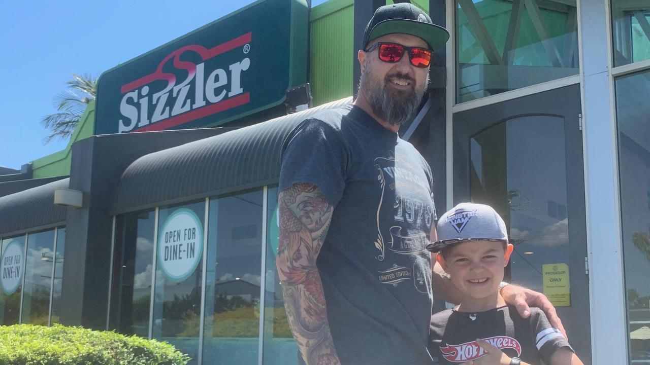 Jai Knarston with dad Matt excited to celebrate his seventh birthday at Sizzler Maroochydore.