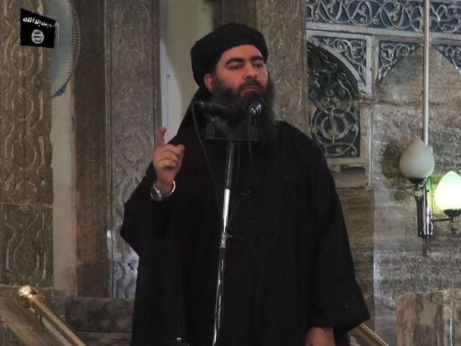 Image from a propaganda video released by al-Furqan Media allegedly shows IS leader Abu Bakr al-Baghdadi addressing Muslim worshippers in Mosul. Picture: AFP