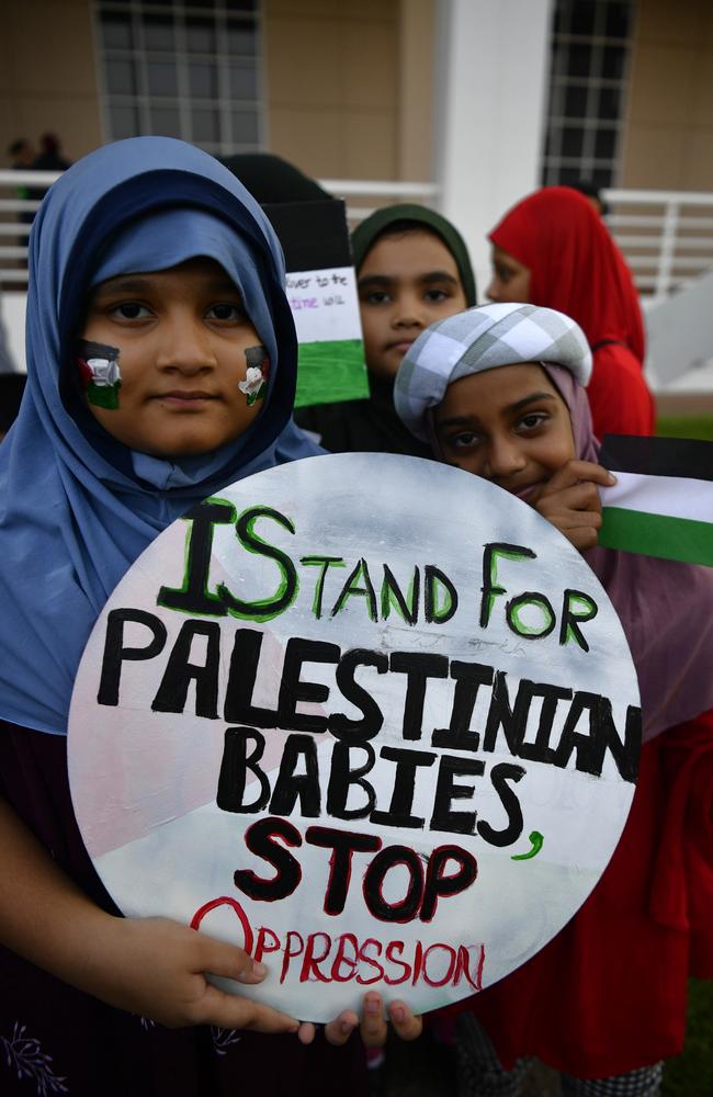 Sidrah Khan, Ayesha Fatima and Safa Khan at a pro-Palestine protest outside of the NT Parliament house on Friday October 27 calling for a ceasefire 20-days into the Gaza conflict.