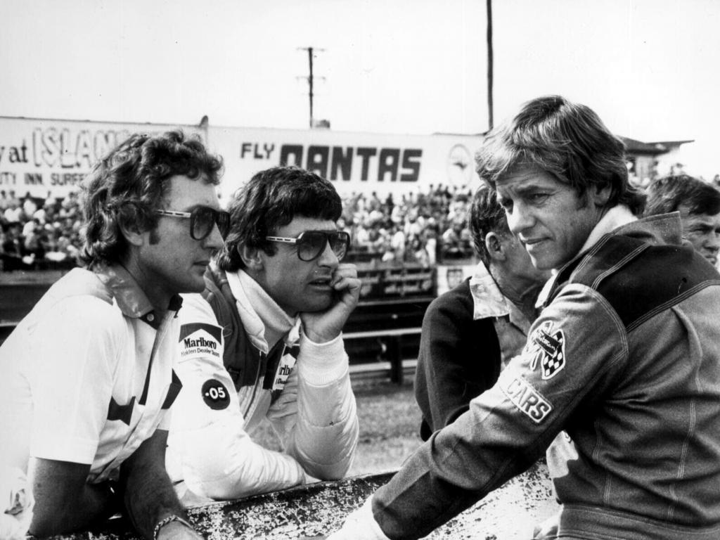 Mobil Holden Dealer Team (MHDT) mgr former driver John Harvey (L) with drivers Peter Brock (C) Dick Johnson (R) before final race of deciding round of 1981 Australian Touring championship at Lakeside. Picture: Supplied