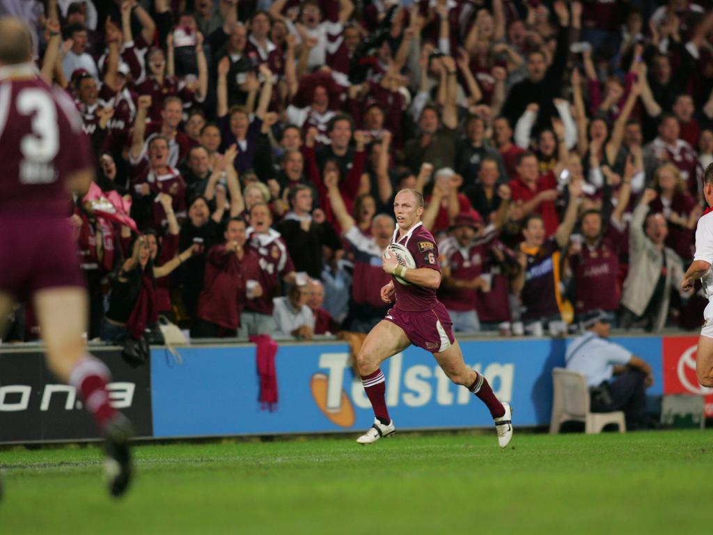 Darren Lockyer scores a try.
