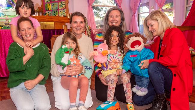 Olive with mum Kiera, Maya with mum Sophia, Aya with mum Asia, Jack the puppet and Lisa Wilson at Lilly Pilly Community Preschool.