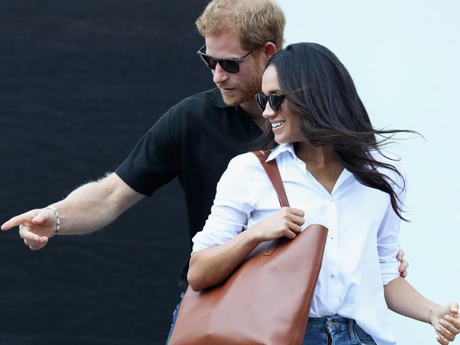 The moment Prince Harry and Meghan surprised the world with their first public appearance in Toronto. Picture: Chris Jackson/Getty Images