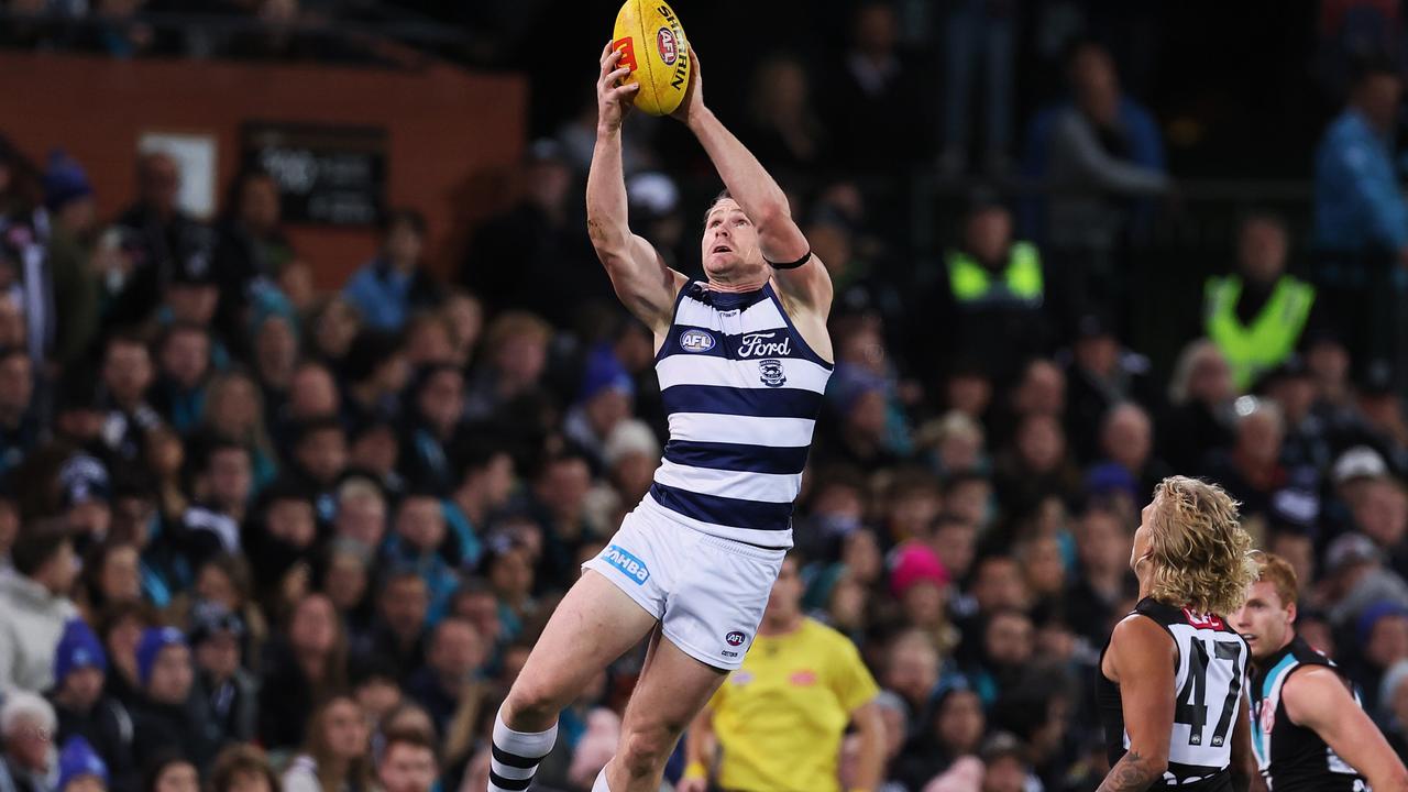 ADELAIDE, AUSTRALIA – JUNE 15: Patrick Dangerfield of the Cats marks over Nathan Barkla of the Power during the 2023 AFL Round 14 match between the Port Adelaide Power and the Geelong Cats at Adelaide Oval on June 15, 2023 in Adelaide, Australia. (Photo by James Elsby/AFL Photos via Getty Images)