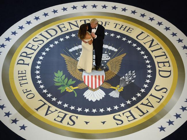 US President Donald Trump and the first lady Melania Trump dance at the Armed Services ball at the National Building museum following Donald Trump's inauguration as the 45th President of the United States in 2017. Picture: Jim Watson/AFP