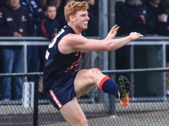 Waverley Blues footballer James Taberner gets a kick away in the Eastern Football League (EFL). Picture: Davis Harrigan