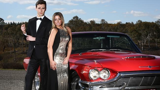 Jordan Sykes and Eden Greaves pose as James Bond and Bond girl for Spyfest. Picture: Chris Pavlich