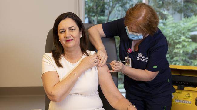 Queensland Premier Annastacia Palaszczuk is given her COVID-19 vaccination by clinical nurse Dawn Pedder at the Surgical Treatment Rehabilitation Service Centre in Brisbane earlier this month. Picture: NCA NewsWire / Sarah Marshall