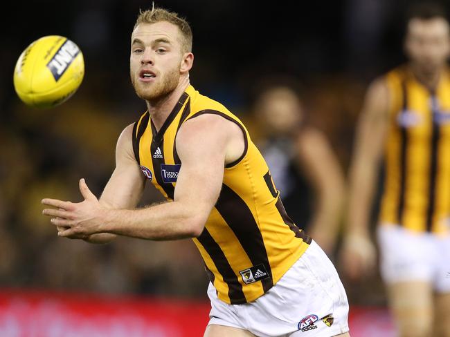 If Tom Mitchell feels unwell after the game, it’s probably because he has leather poisoning. Picture: Michael Klein