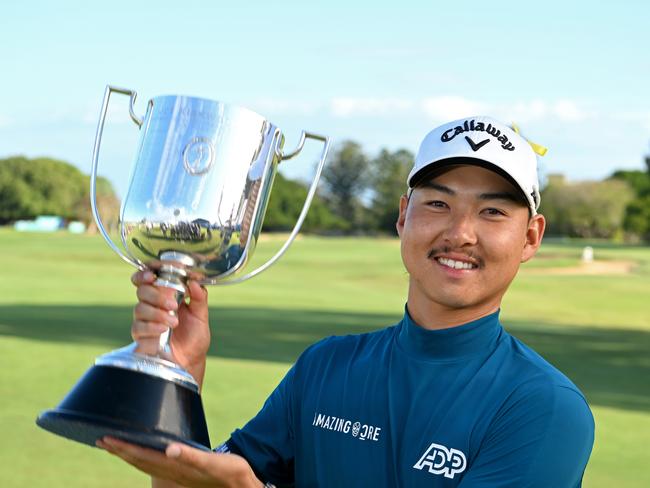 Min Woo Lee celebrates victory with the Kirkwood Cup. Picture: Bradley Kanaris/Getty Images