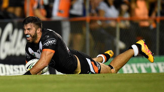 James Tedesco bagged a hat-trick of tries in the Tigers rout of Manly