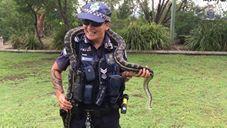 AU QLD:    Police Officer Reunites With Python After Eight Years, Freaks Out   December 15