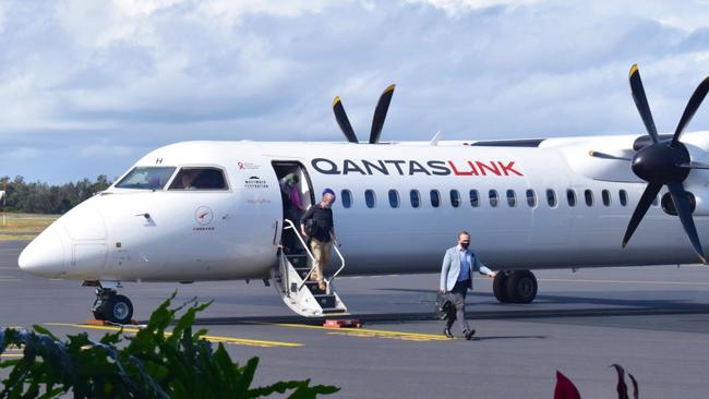 Qantas' first direct flight between Brisbane and Coffs Harbour touched down at Coffs Harbour Airport on Thursday.