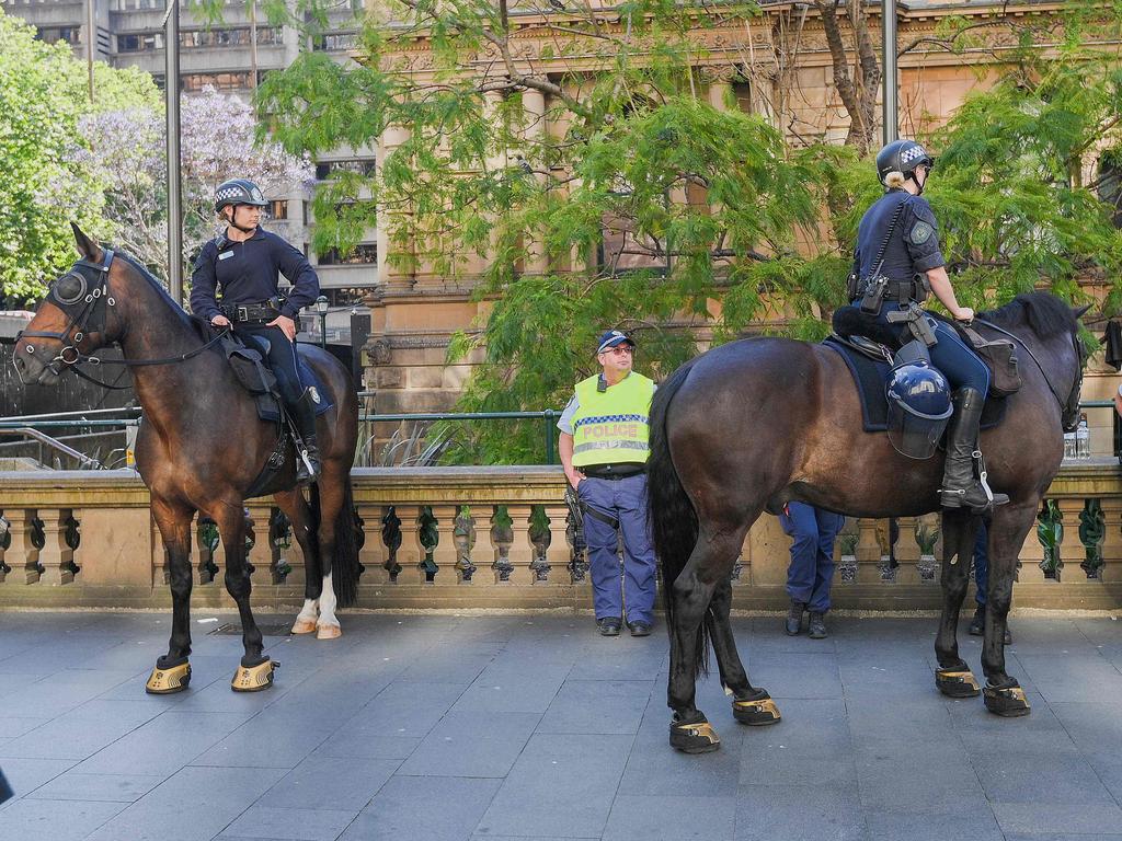 Mounted police keep watch. (Photo by Izhar KHAN / AFP)