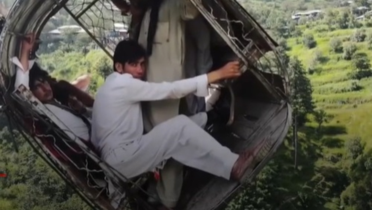 Astonishing new footage has captured how passengers held on to dear life inside a stranded cable car for 16 hours in Pakistan before they were rescued.