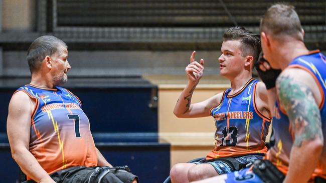 SunCity Wheelers founder Byron Holman (13, right) chats tactics with Andy Branson (7, left). Picture: Linda Bone Photographer