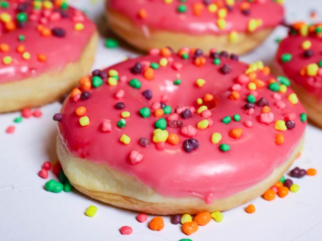 Dr Dough Donuts’ signtature pink glaze sprinkled with Nerds. Picture: Jenifer Jagielski