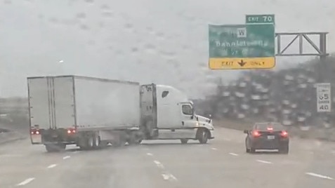 A woman caught the terrifying moment a truck slid across multiple lanes of traffic and jackknifed on a highway in Kansas City, Missouri. Picture: Gracie Fudge via Storyful