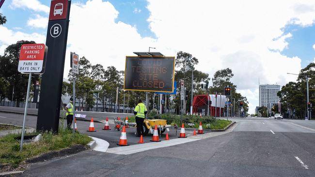 A sign advising of the closure of a Covid-19 drive through testing clinic in Olympic Park. Picture: NCA NewsWire / Flavio Brancaleone