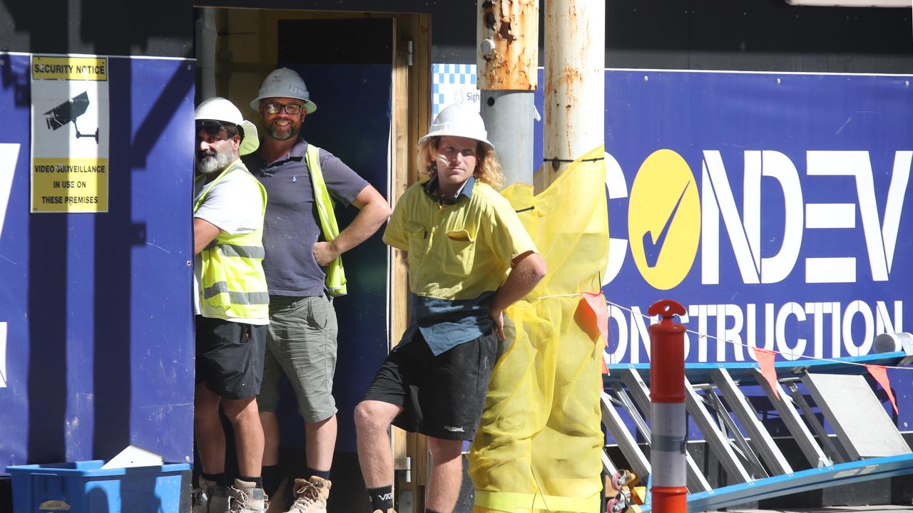 Workers at a Condev site. Picture: Glenn Hampson