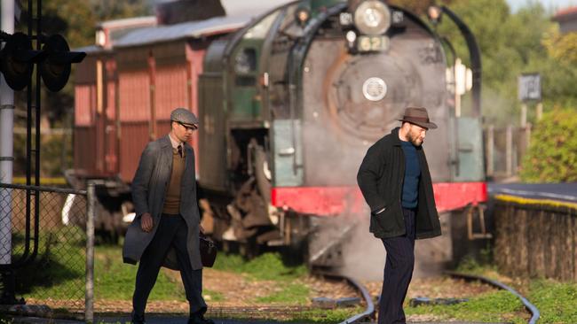 Actor Jai Courtney in front of a historic train at Port Elliot. Picture: Leon Mead Photography