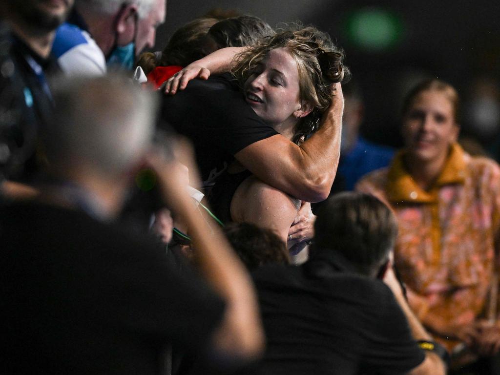 O’Callaghan embraces coach Dean Boxall during the 2022 Australian Championships. Picture: Brenton Edwards / AFP