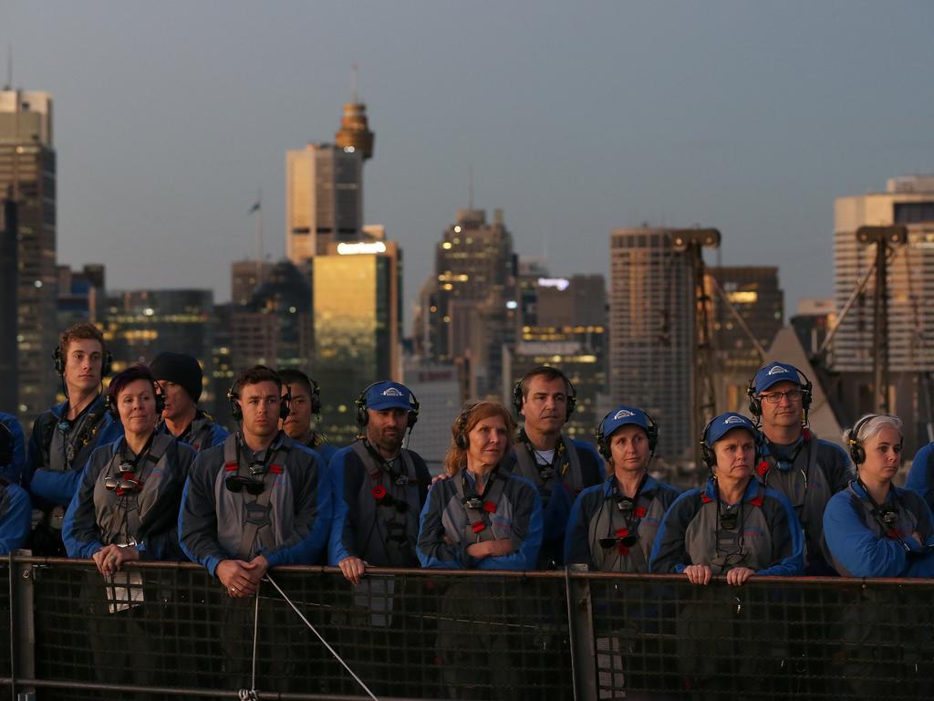 A dawn service was held on the summit of the Sydney Harbour Bridge to commemorate ANZAC Day. Money raised by the members of the public who climbed the bridge went to RSL DefenceCare. Picture: Toby Zerna