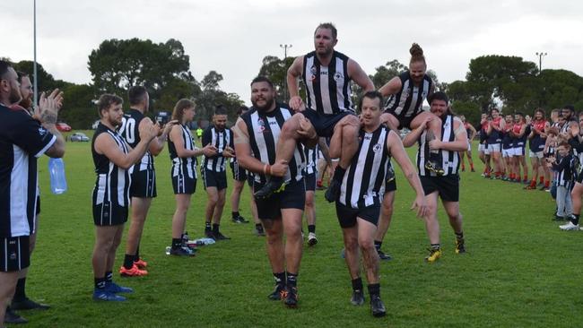 Salisbury player Sean Poysden is chaired off last season. Picture: Salisbury Football Club