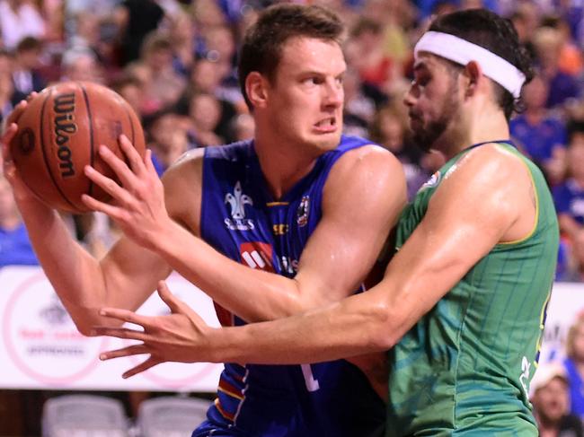 12/12/15 - Adelaide 36ers v Townsville Crocs at Adelaide Arena. Crocs' Omar Samhan defends 36ersÕ Daniel Johnson Photo Tom Huntley