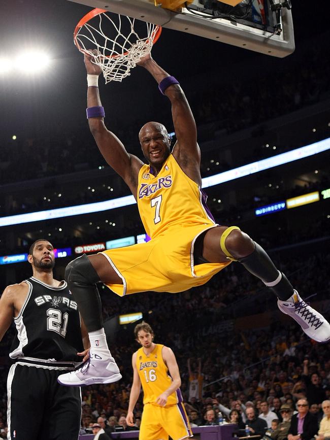 Lamar Odom of the Los Angeles Lakers dunks the ball as Tim Duncan of the San Antonio Spurs looks on in the third quarter in Game Two of the Western Conference Finals during the 2008 NBA Playoffs on May 23, 2008 in Los Angeles. Picture: Getty