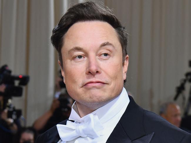 FILES) In this file photo taken on May 02, 2022, Elon Musk arrives for the 2022 Met Gala at the Metropolitan Museum of Art in New York. - US billionaire Elon Musk was embroiled in a social media spat with Ukrainian officials including President Volodymyr Zelensky on October 3, 2022, over his ideas on ending Russia's invasion. (Photo by Angela Weiss / AFP)