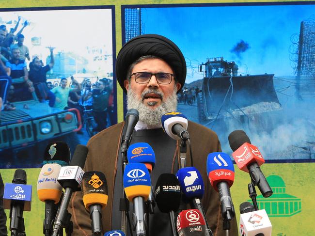 Senior Hezbollah official Hashem Safieddine addresses a rally in the southern suburbs of Beirut on October 8, 2023, in support of the 