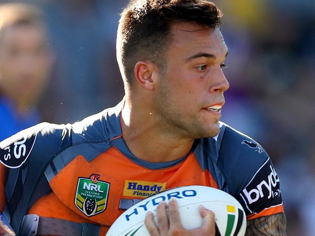 Tigers Luke Brooks tackled by Storm's Cameron Smith during the round 4 NRL game between the Wests Tigers and the Melbourne Storm at Leichhardt Oval , Leichhardt . Picture : Gregg Porteous