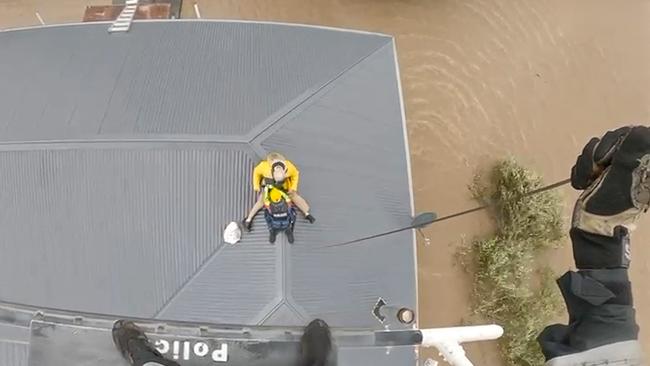 Including many trapped on rooftops after attempting to escape. Picture: AFP