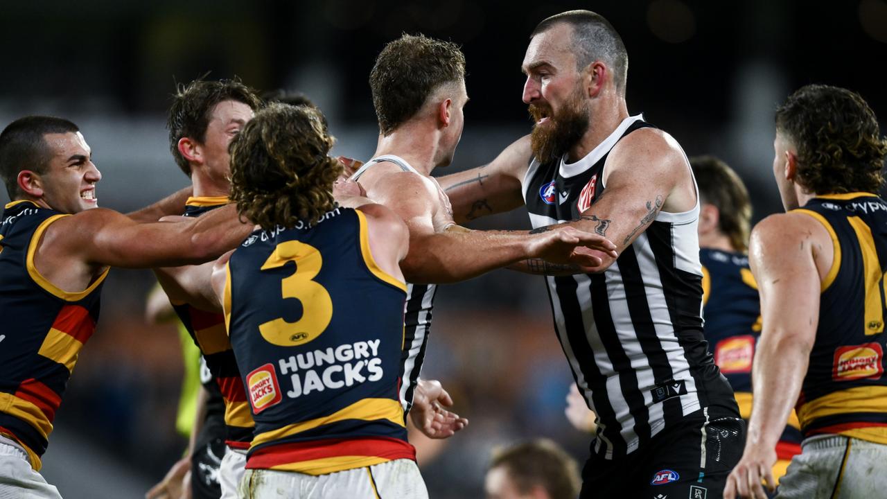 ADELAIDE, AUSTRALIA – AUGUST 17: Dan Houston of the Power is attacked by Crows players after his hit on Izak Rankine of the Crows during the round 23 AFL match between Port Adelaide Power and Adelaide Crows at Adelaide Oval, on August 17, 2024, in Adelaide, Australia. (Photo by Mark Brake/Getty Images)