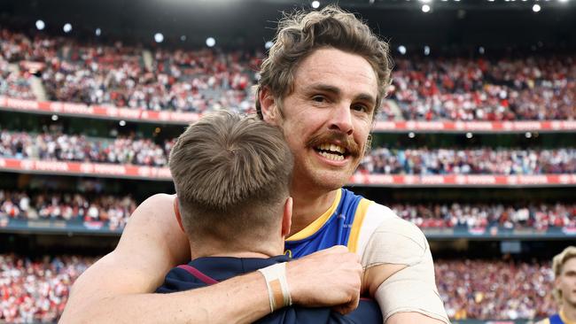 MELBOURNE, AUSTRALIA – SEPTEMBER 28: Lincoln McCarthy (left) and Joe Daniher of the Lions celebrate during the 2024 AFL Grand Final match between the Sydney Swans and the Brisbane Lions at The Melbourne Cricket Ground on September 28, 2024 in Melbourne, Australia. (Photo by Michael Willson/AFL Photos via Getty Images)