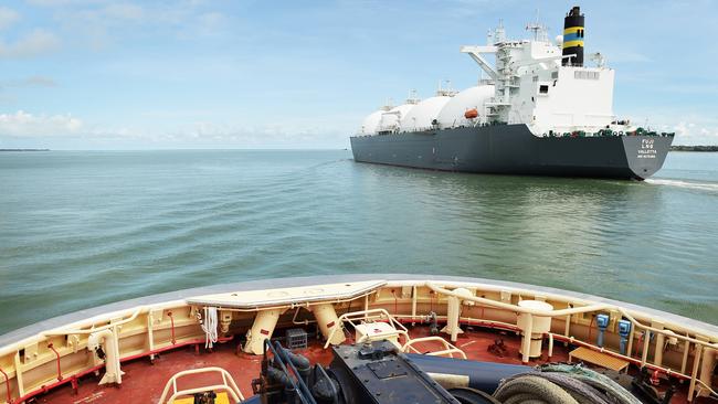 The NAB will continue to support some LNG projects. Above, an LNG tanker leaving Darwin Harbour. Picture: Aaron Burton