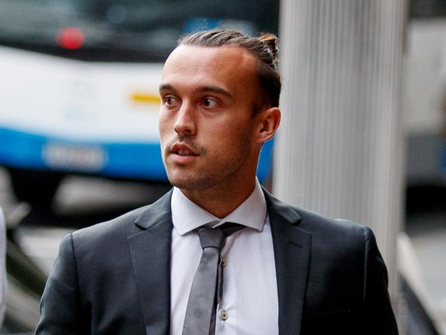 SYDNEY, AUSTRALIA - NewsWire Photos JULY 4, 2024: Clayton Lewis arrives at the Downing Centre District court on Thursday. One of three Macarthur FC players accused of spot-fixing by earning yellow cards. Picture: NewsWire / Nikki Short