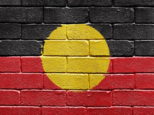 Flag of Aborigines on brick wall