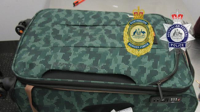 A man allegedly had drugs hidden in the lining of this suitcase.